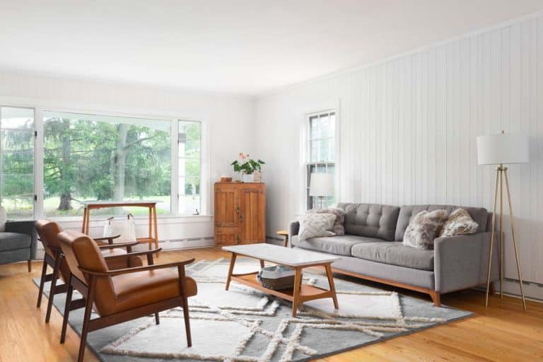 livings space with white wall couch and coffee table