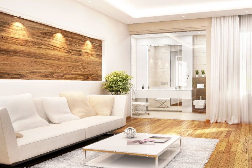 View of the stunning room with soffit lighting and a modern bathroom